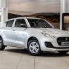 2024 used Suzuki Swift 1.2 GA in vibrant color, highlighting its compact design, fuel efficiency, and advanced safety features.