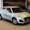 2024 used Suzuki Swift 1.2 GA in vibrant color, highlighting its compact design, fuel efficiency, and advanced safety features.