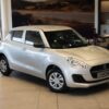 2024 used Suzuki Swift 1.2 GA in vibrant color, highlighting its compact design, fuel efficiency, and advanced safety features.