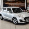 2024 used Suzuki Swift 1.2 GA in vibrant color, highlighting its compact design, fuel efficiency, and advanced safety features.