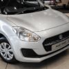 2024 used Suzuki Swift 1.2 GA in vibrant color, highlighting its compact design, fuel efficiency, and advanced safety features.