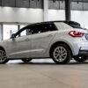 Audi A1 Sportback 30 TFSI Advanced S Tronic in a sleek urban setting, showcasing its modern design and features.