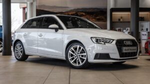 Audi A3 Sportback 1.4 TFSI parked in a scenic location, showcasing its sleek design and modern features.