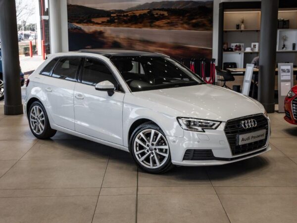 Audi A3 Sportback 1.4 TFSI parked in a scenic location, showcasing its sleek design and modern features.