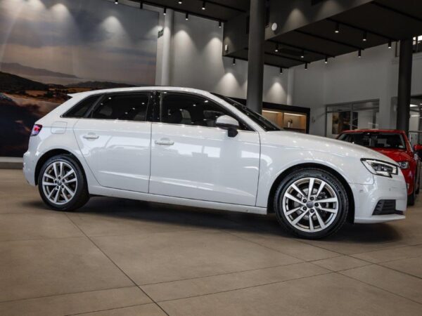 Audi A3 Sportback 1.4 TFSI parked in a scenic location, showcasing its sleek design and modern features.