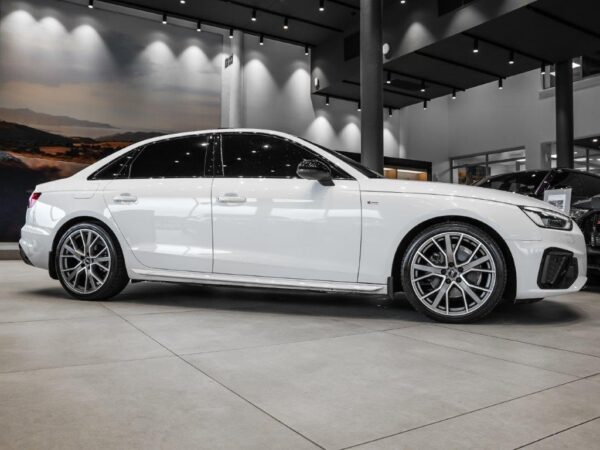 Audi A4 40 TFSI S Line Stronic (B9) in white, showcasing its sleek design and sporty features.